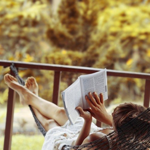 woman relaxing reading